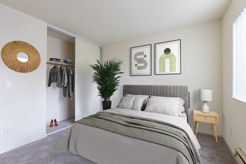 A bedroom with a large bed and a plant at Cherrywood Apartments, San Jose, 95118