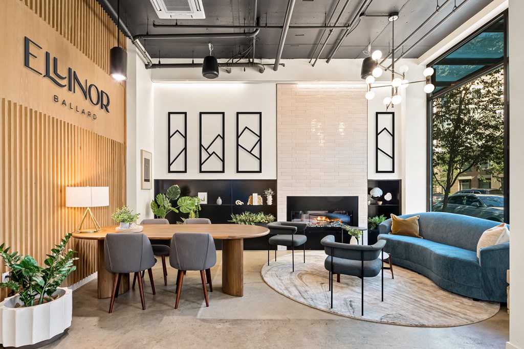 a room filled with furniture and a large window