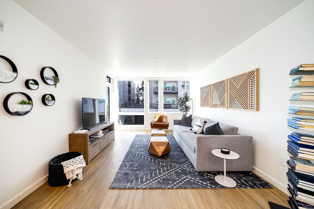 a living room with a couch and a tv