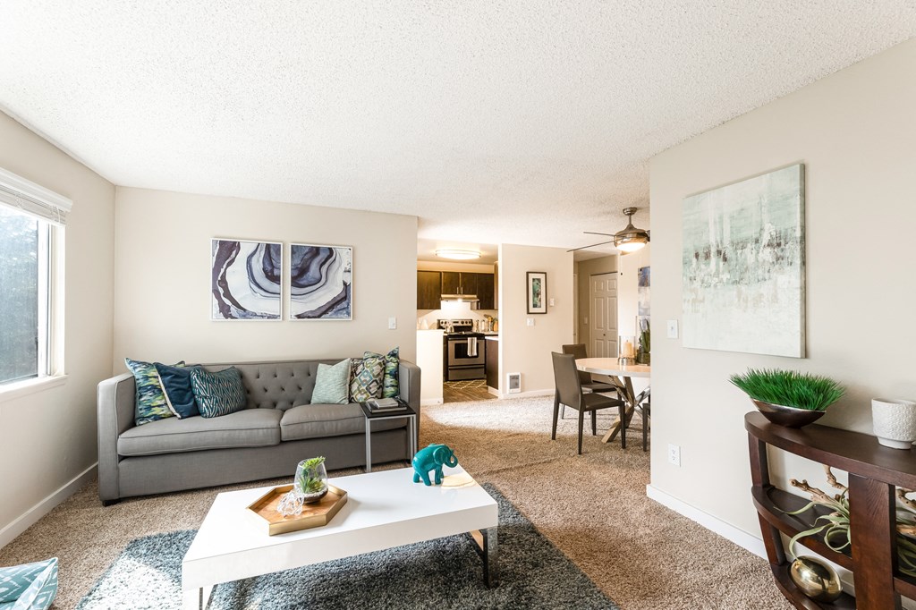 a living room with a couch and a coffee table