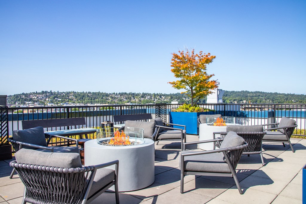 the rooftop patio at the halifax in hoboken has a firepit and views of the