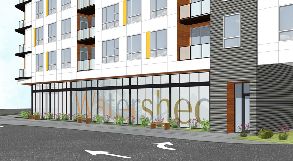 a rendering of a building with a street in front of it