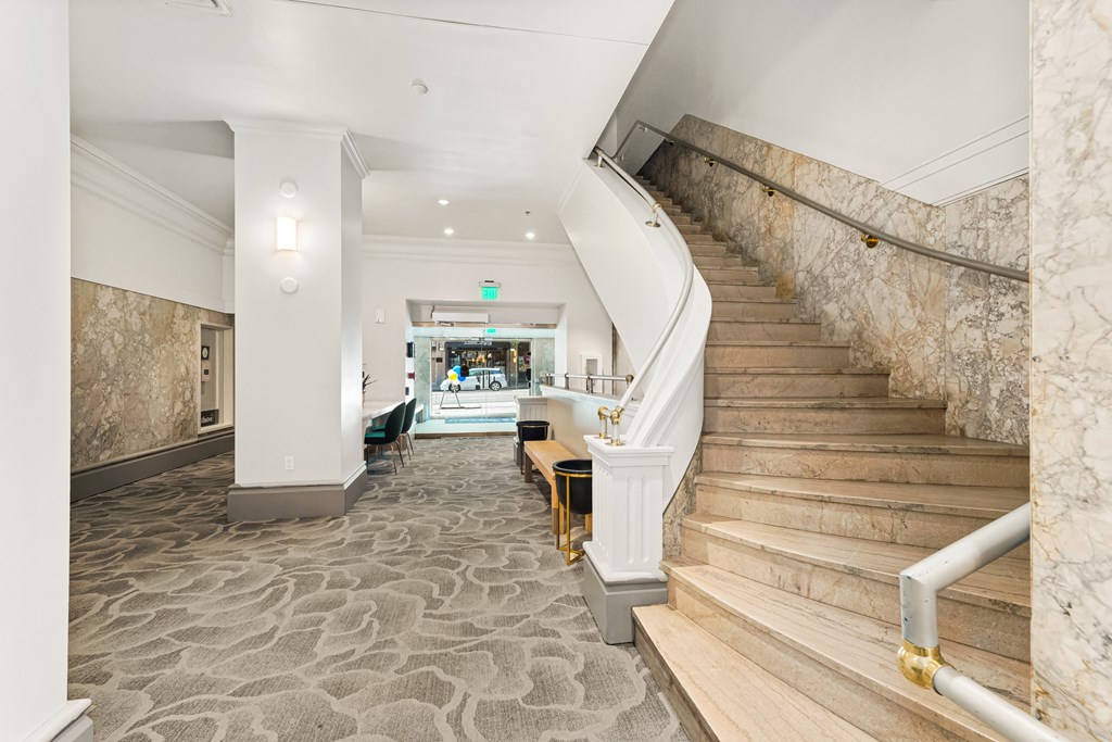 a view of the lobby from the top of the stairs
