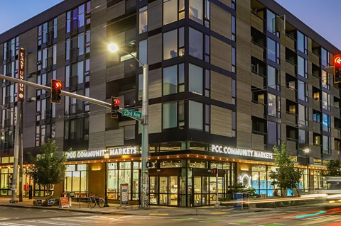 a night view of a building with a traffic light