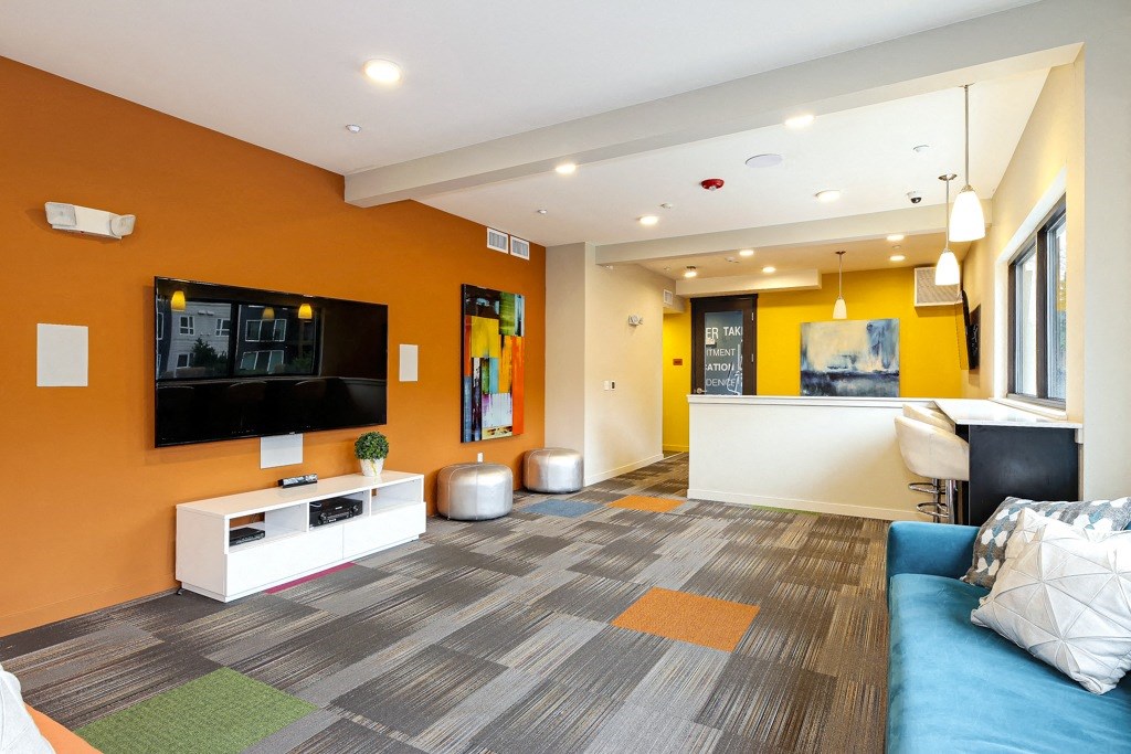 a living room with a couch and a television