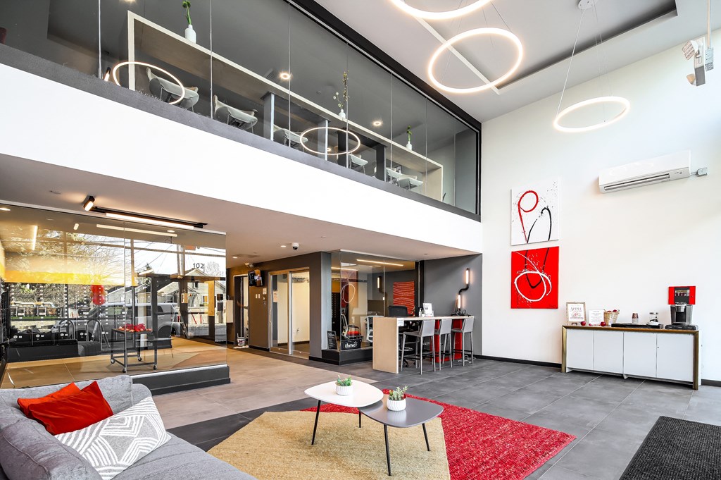 a living room with a couch and tables
