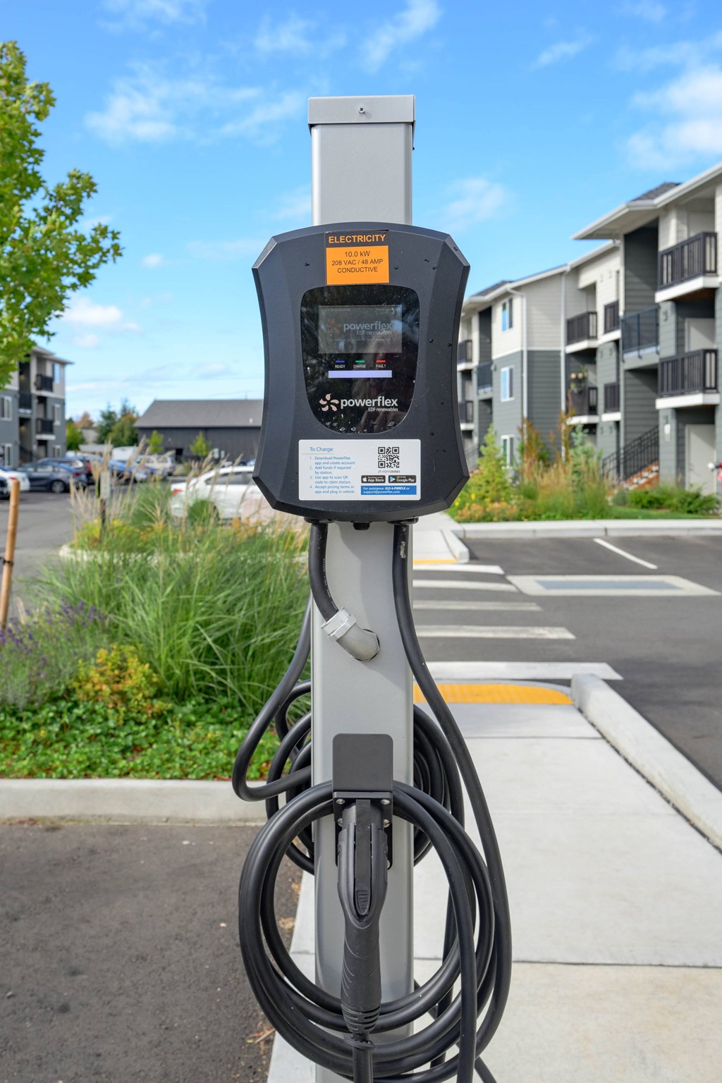 A parking meter with a screen and a keypad on it.