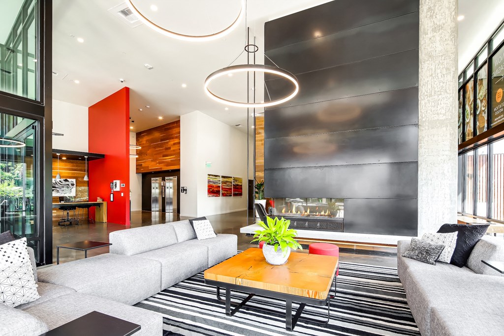 a living room with couches and a coffee table