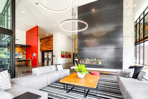 a living room with couches and a coffee table