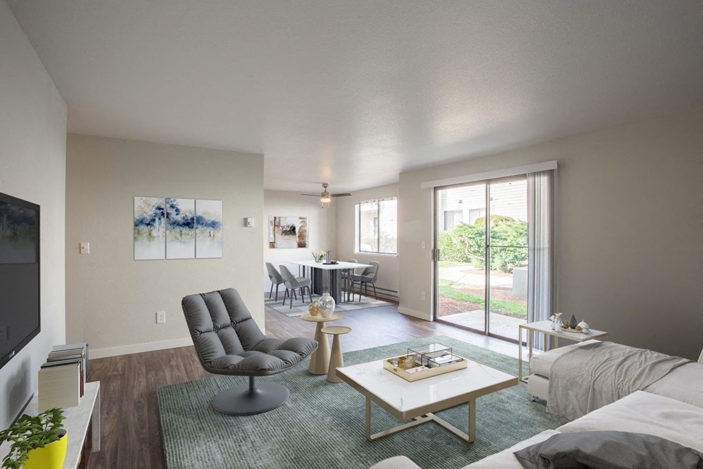 the living room of an apartment with a couch and a coffee table