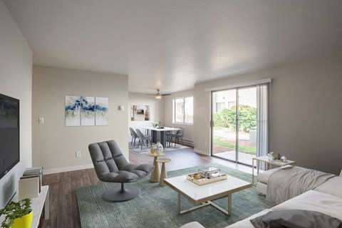 the living room of an apartment with a couch and a coffee table