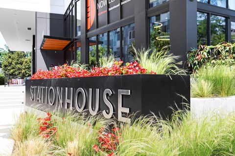 the facade of a building with a sign that reads school house