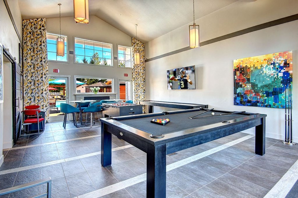 Billiards Table with Foosball Table and High Ceilings at Clock Tower Village, DuPont