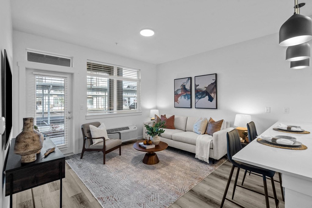 a living room with a couch and a table