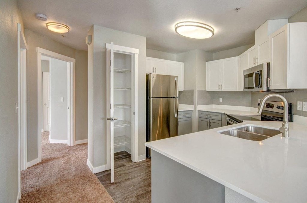 kitchen with stainless steel appliances at Clock Tower Village, DuPont