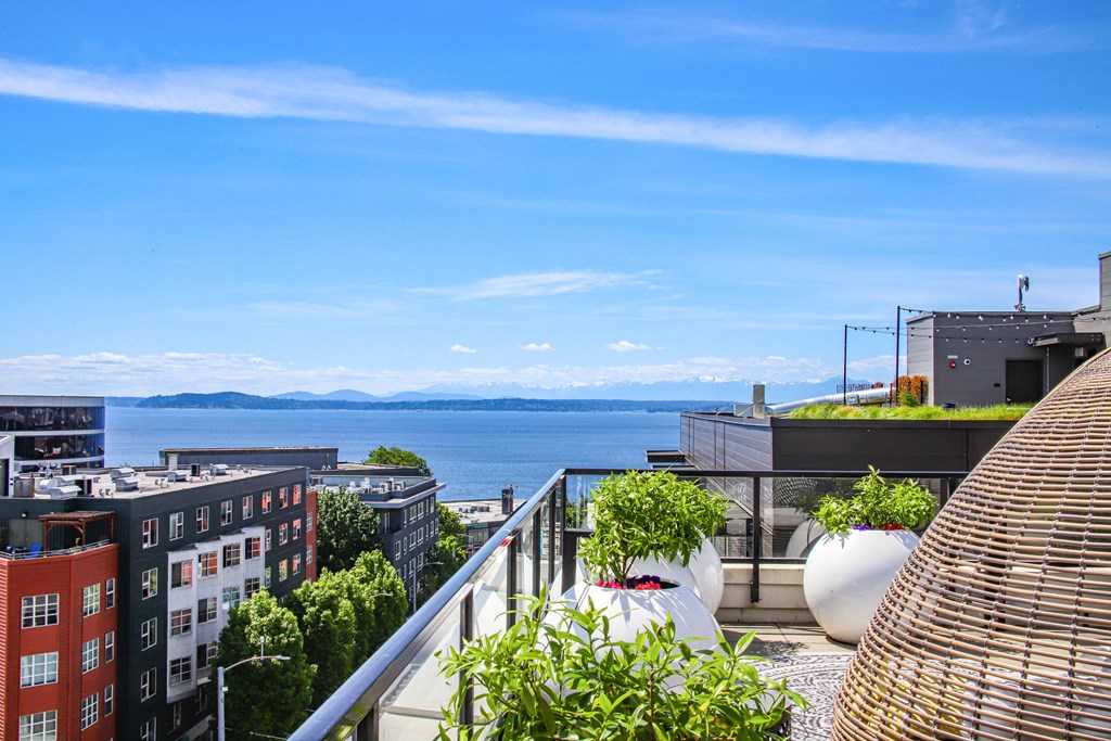 a city view from a balcony overlooking the water