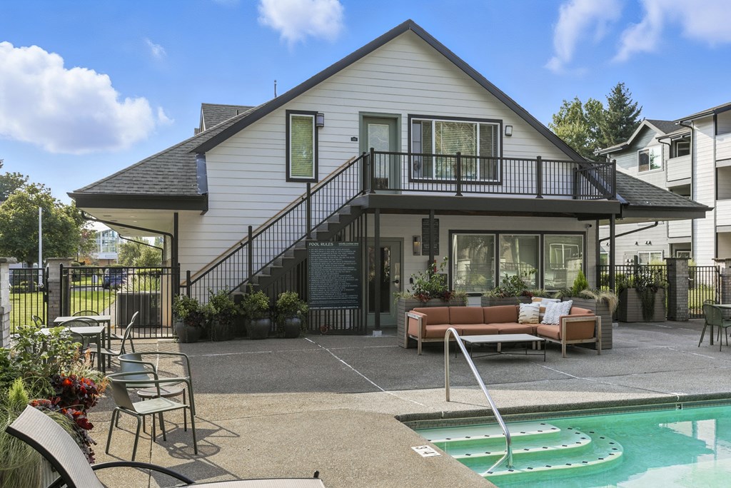 A house with a pool in the backyard.