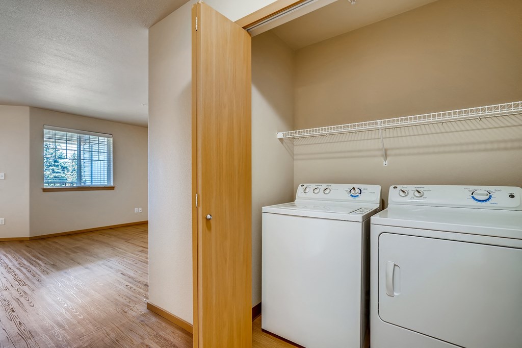 A laundry room with a washer and dryer.