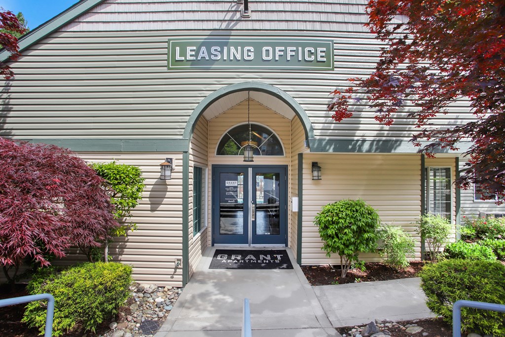 the front of the leasing office of the leesing office building