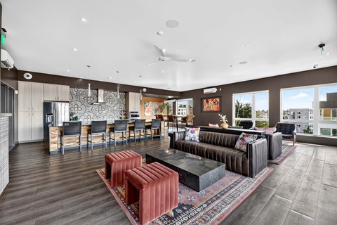 A modern living room with a large sofa and a coffee table.