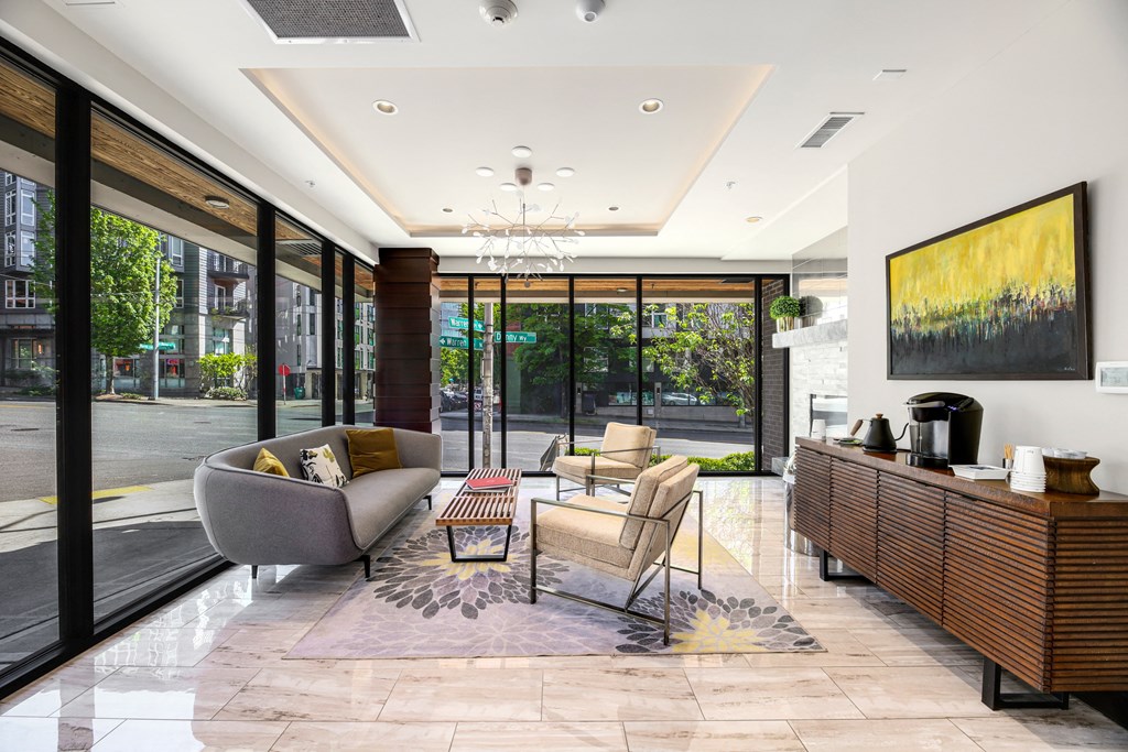 a living room with couches and chairs and a coffee table
