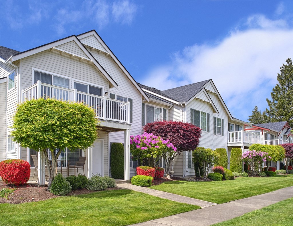 Apartment Building Exterior with Gorgeous Landscaping, and Sidewalks at Clock Tower Village, Washington, 98327