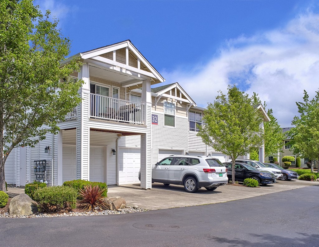 Community exterior with attached garages at Clock Tower Village, DuPont Washington