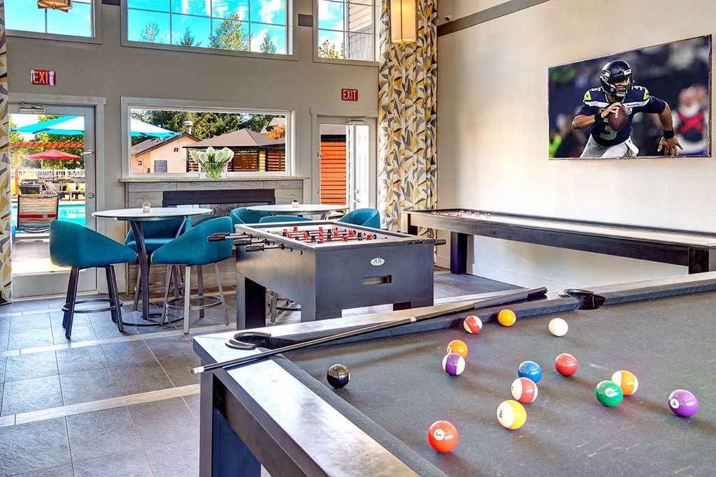 game room with pool table at Clock Tower Village, DuPont Washington