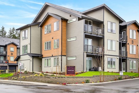 Apartment building with a sign that says "Pinehurst".