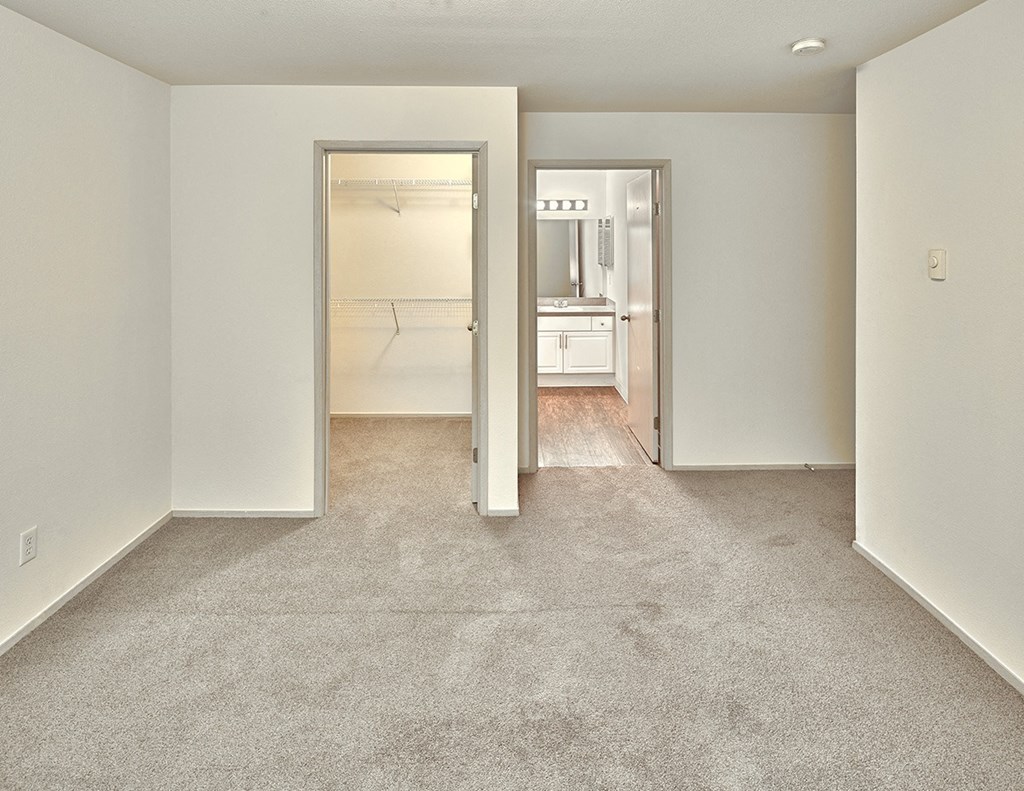 bedroom with large closet at Clock Tower Village, Washington