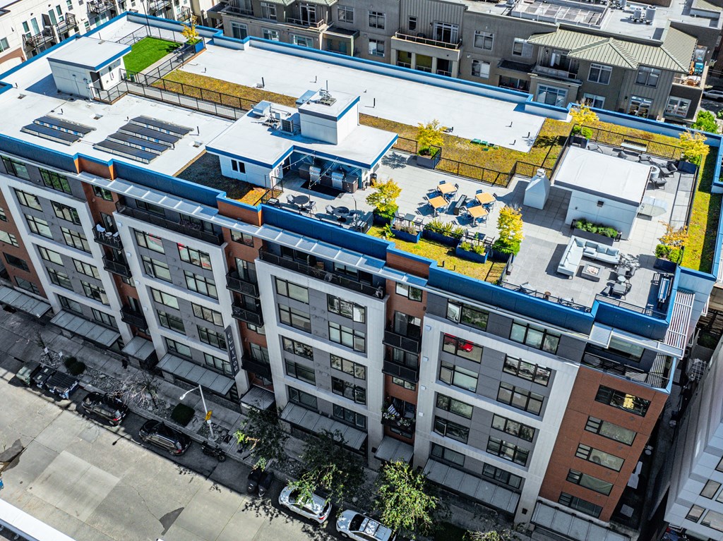 an aerial view of an apartment building in a city