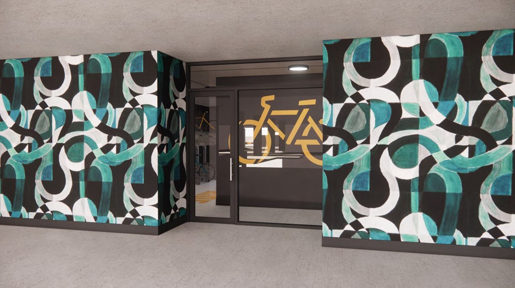 a door to a room with a mural on the wall