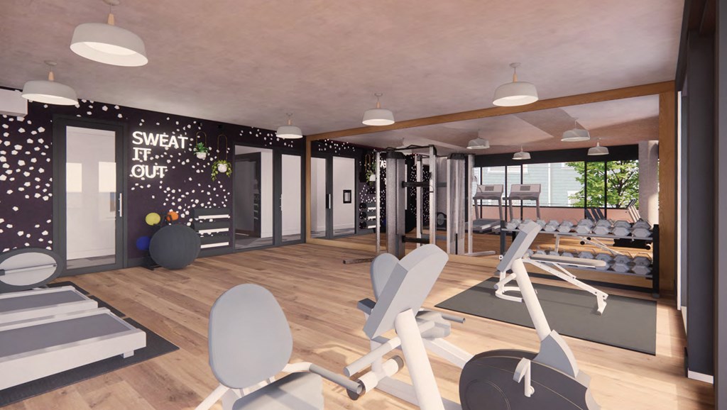 a gym with white chairs and exercise equipment on a wooden floor