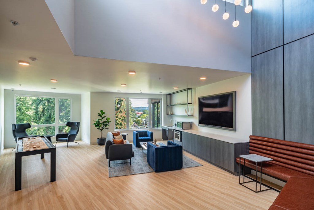 a living room with a couch and a tv