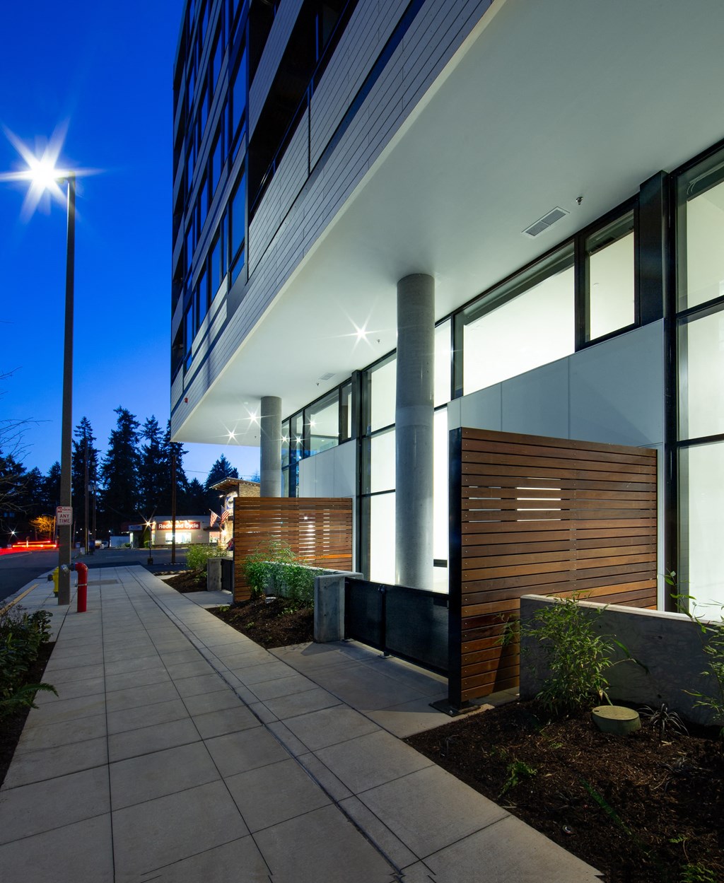 a view of the front of a building at night