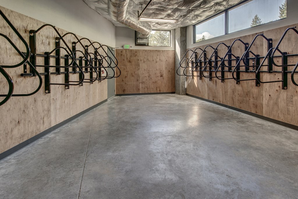 a large room with a row of wine racks on the wall