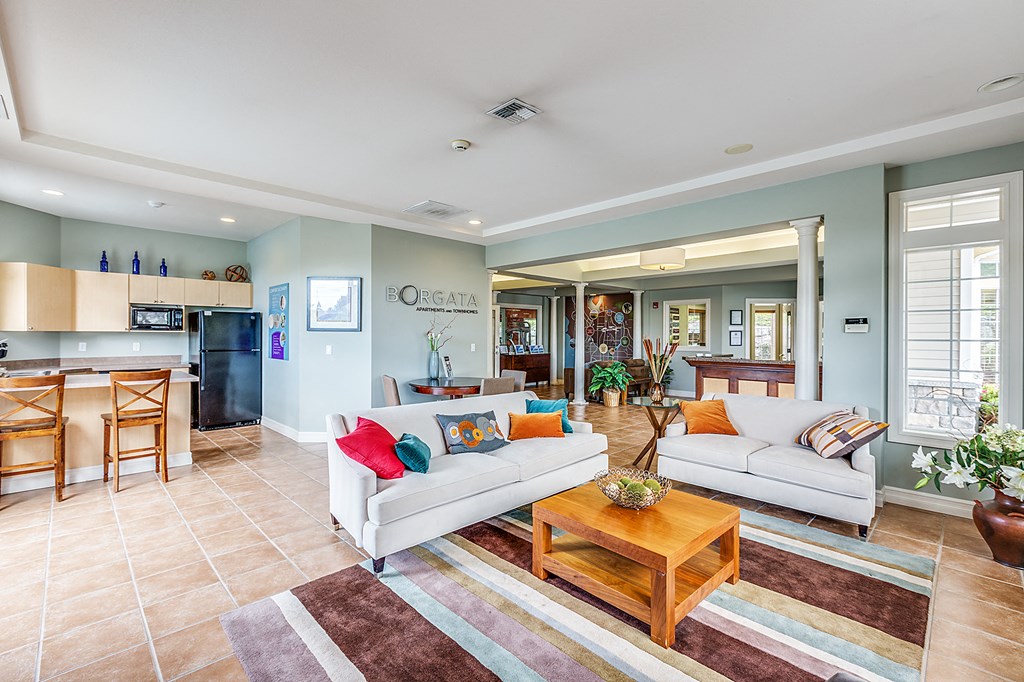 the living room and kitchen are open to the dining room and living room area