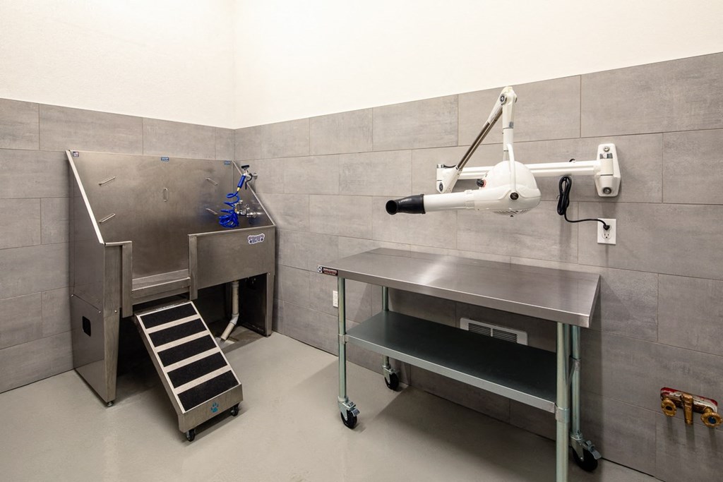 a large industrial kitchen with a plane on the wall