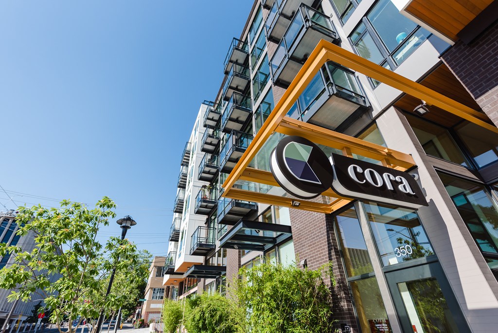 a building with a sign that reads cora
