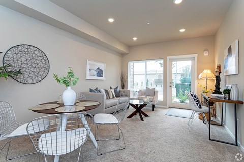 a living room with a couch and a table