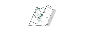 A floor plan of a house with a deck/patio and a kitchen.