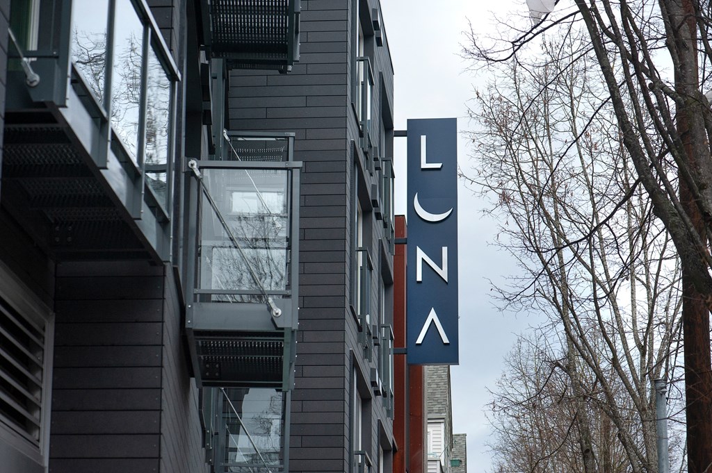 a large sign on the side of a building