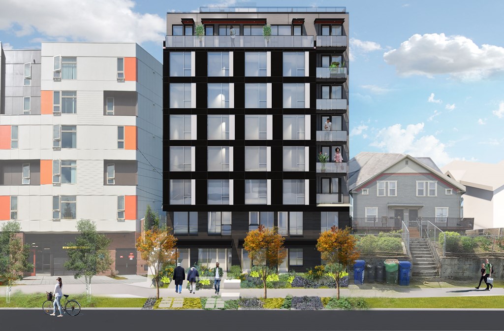 a rendering of an apartment building with a black facade