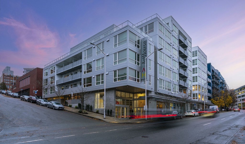 a large grey building on a city street