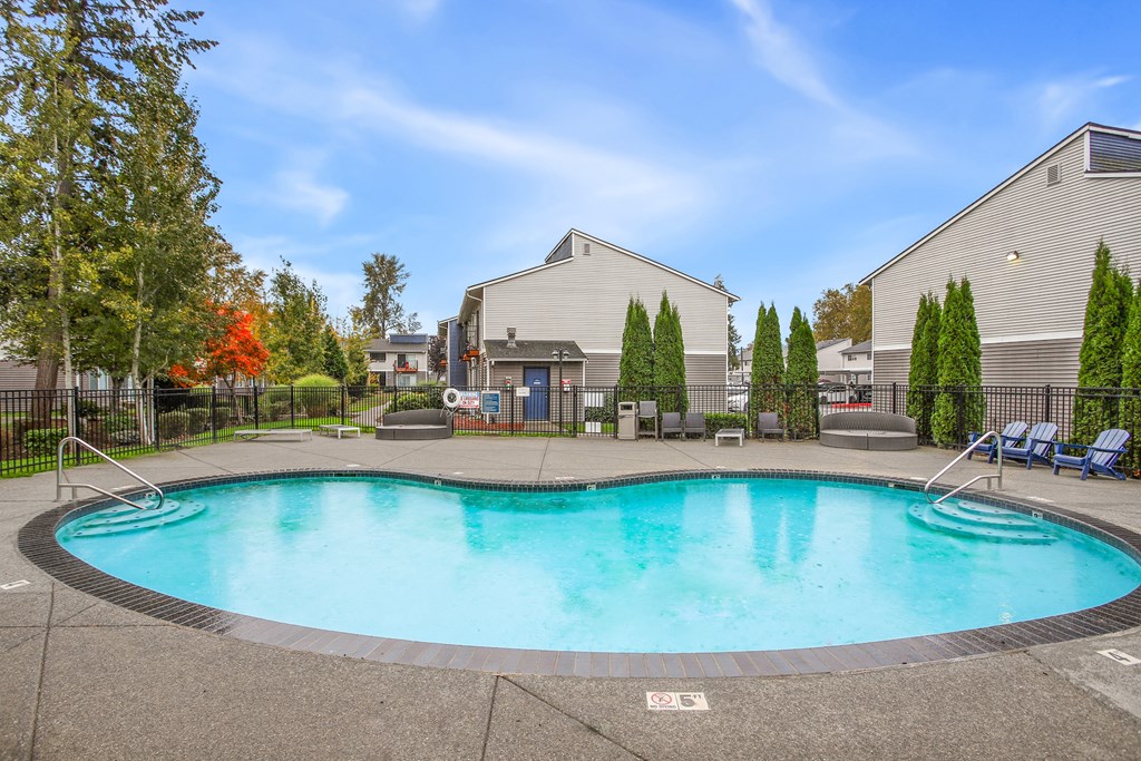 the preserve at ballantyne commons pool and spa with apartment buildings
