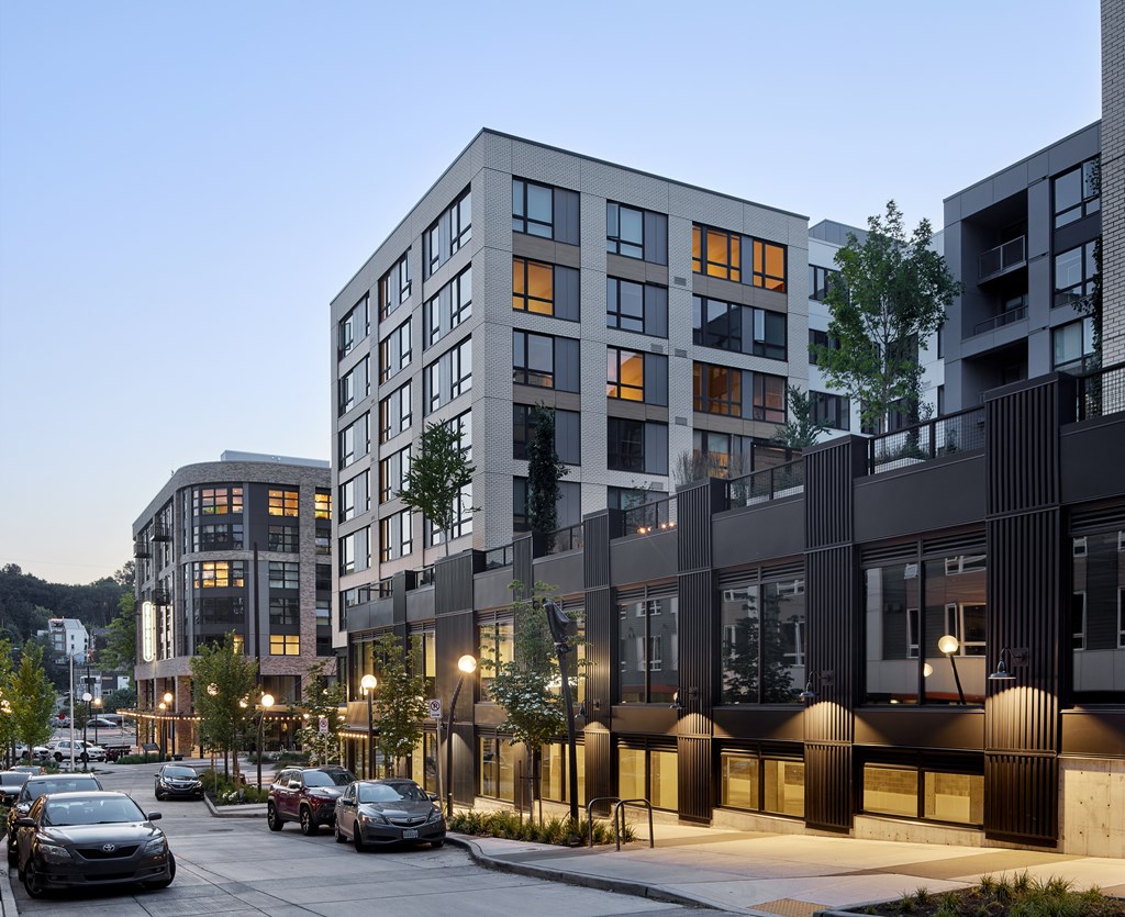 A modern building with a lot of windows is shown.