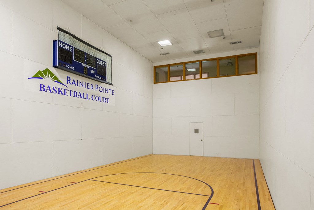a basketball court in the gym at rainbow pointe basketball court