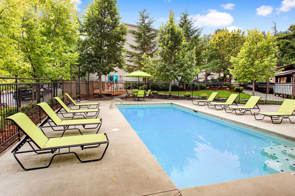 our apartments have a swimming pool with chaise lounge chairs