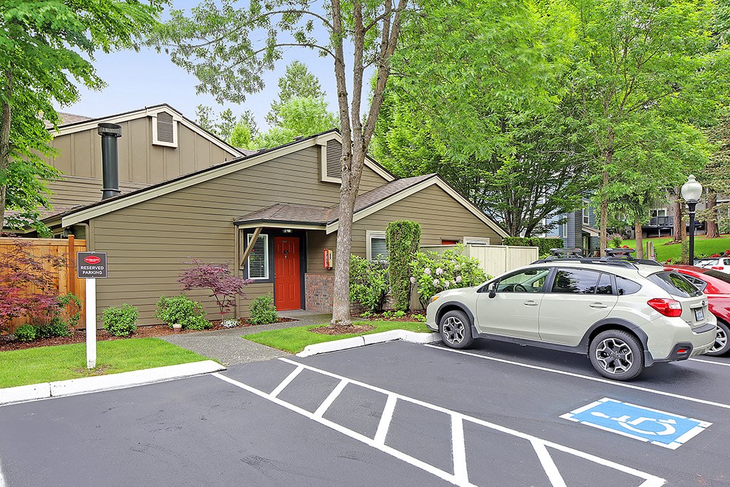 a house with a car parked in front of it