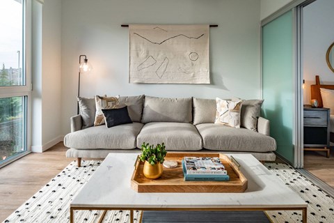 a living room with a couch and a coffee table